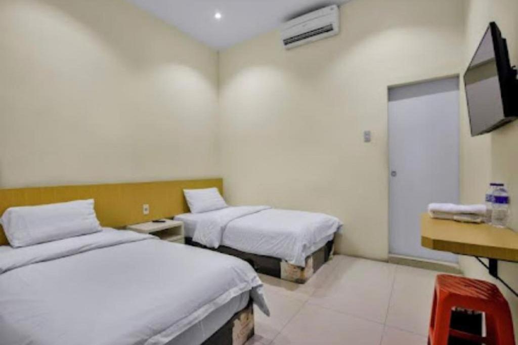 Oyo 92772 Losmen Diah Syariah Langsa Exterior foto